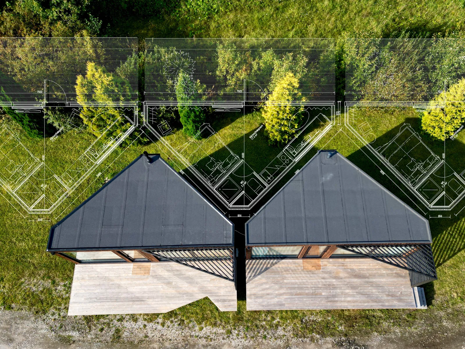 Two Corner Houses seen from directly above with site-plan sketch overlays on the surrounding grass